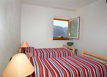 Appartamento a Predazzo. La seconda camera è possibile averla su richiesta con letto matrimoniale oppure due letti singoli oppure 3/4 letti singoli.